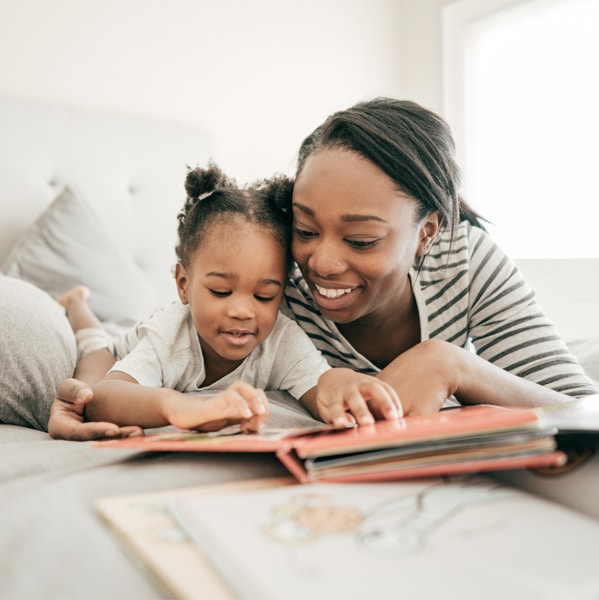 Mom reading to baby